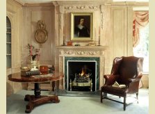 Limed pine panelled drawing room in the Georgian style with Hallidays Romney mantelpiece and Georgian firegrate